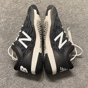 New Balance Black and White Turf Shoes